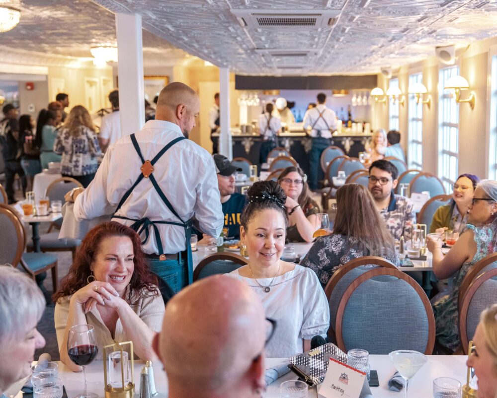 The dining room filled with guests enjoying the Dinner Buffet aboard the Capitol